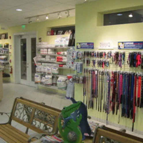 Waiting area and merchandise on shelving at Quail Hollow Animal Hospital